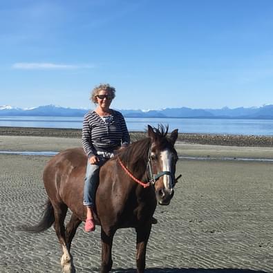 Girl and Sheila on the beach